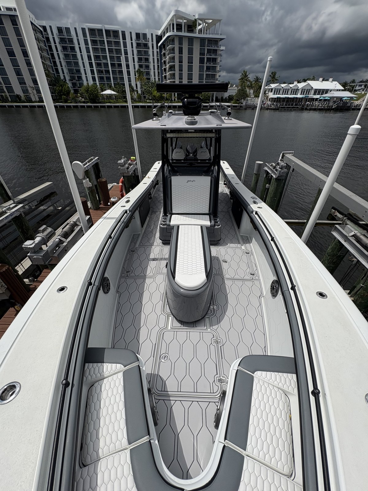 Cockpit sole and leaning post on a Yellowfin center console, white hexagon-pattern planking